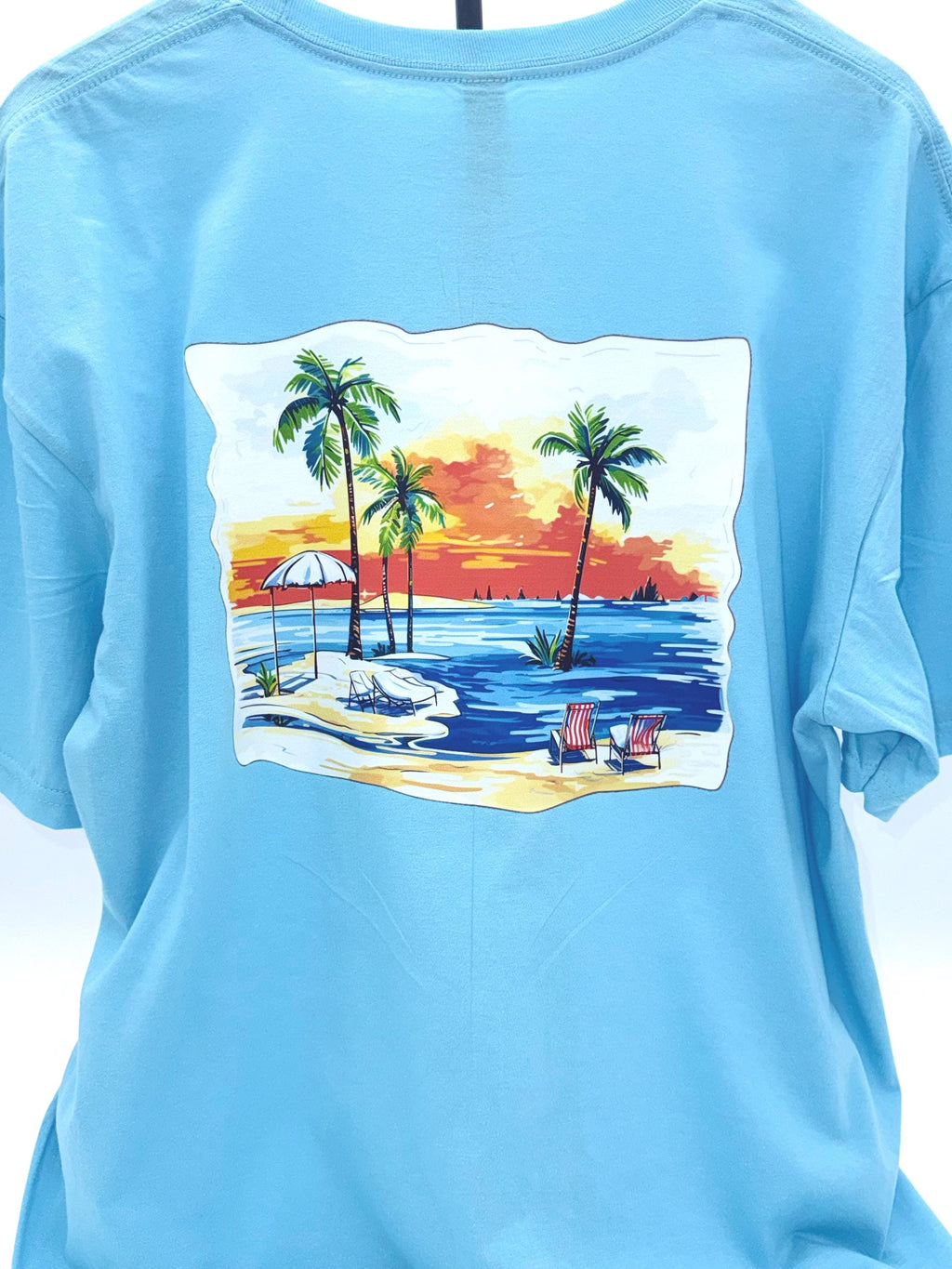 Tropical Sunset Beach Scene T-Shirt: Palm Trees, Ocean Waves, Chairs