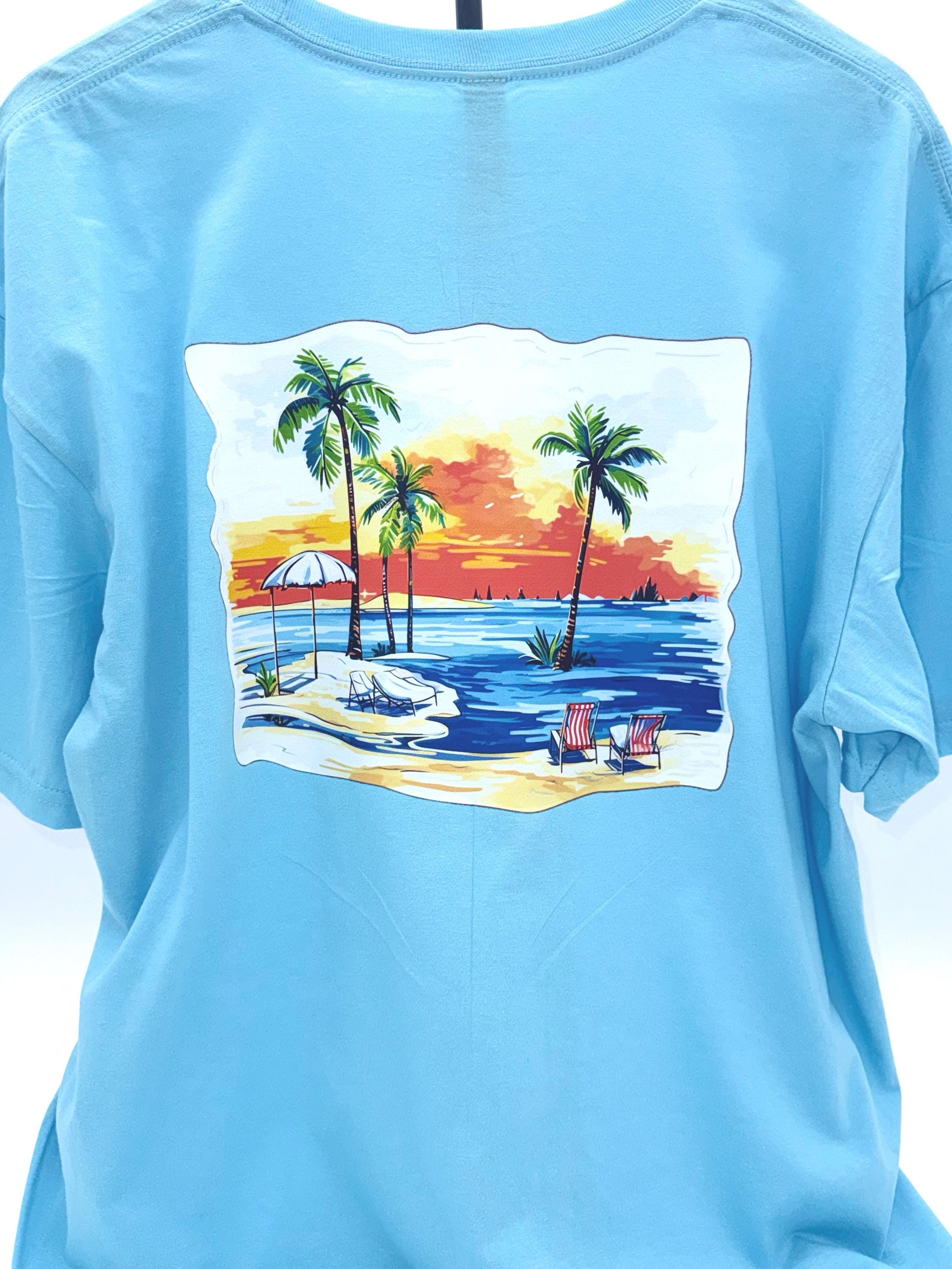 Tropical Sunset Beach Scene T-Shirt: Palm Trees, Ocean Waves, Chairs